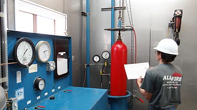 all-fire-services-employee2 An employee applying a fire suppression system to a business in Charlotte, NC